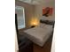 Bedroom featuring a bed with nightstand and a ceiling fan at 223 Palermo St, Davenport, FL 33897