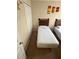 bedroom featuring two twin beds with a closet on the left at 223 Palermo St, Davenport, FL 33897
