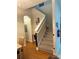 Open staircase leads to the upper level of the home at 223 Palermo St, Davenport, FL 33897
