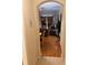 Living room entryway featuring hardwood floors and inviting neutral colors at 223 Palermo St, Davenport, FL 33897