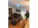 Comfortable living room features stylish decor, hardwood floors, and ceiling fan at 223 Palermo St, Davenport, FL 33897