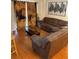 Cozy living room featuring a comfortable sectional sofa and hardwood floors at 223 Palermo St, Davenport, FL 33897