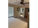 Main bedroom leading to ensuite bathroom offers a peaceful retreat with natural light at 223 Palermo St, Davenport, FL 33897