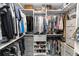 Spacious walk-in closet with custom shelving, ample storage, and well-organized wardrobe at 225 Temple Cir, Eustis, FL 32726
