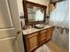 Tastefully remodeled bathroom showcasing modern vanity, updated mirror, and fixtures at 2429 S Laurel Ave, Sanford, FL 32771