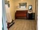 Bright bedroom featuring wooden floors, a vanity, and window treatments at 2429 S Laurel Ave, Sanford, FL 32771