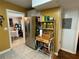 Spacious kitchen featuring stainless steel appliances, tile floors, and ample storage at 2429 S Laurel Ave, Sanford, FL 32771
