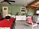 Versatile outdoor space with laundry facilities, a dining table, and comfortable seating at 2429 S Laurel Ave, Sanford, FL 32771