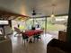 Spacious open patio with a dining table, grill, and views of the backyard at 2429 S Laurel Ave, Sanford, FL 32771