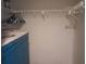 Walk-in closet with white wire shelving offering ample space for storage at 25210 Northlake Dr # 210, Sanford, FL 32773