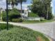 Northlake Village entrance with lush landscaping and inviting curb appeal at 25210 Northlake Dr # 210, Sanford, FL 32773