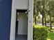 Exterior building entrance, stairs, with security cameras at 25210 Northlake Dr # 210, Sanford, FL 32773