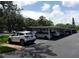 Designated covered parking area with ample space for residents and guests at 25210 Northlake Dr # 210, Sanford, FL 32773