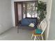 Cozy patio seating with views of the water and mature landscaping at 25210 Northlake Dr # 210, Sanford, FL 32773