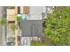 Overhead view of the home's roof, patio, and backyard space, with surrounding trees and neighborhood at 2541 Leeward Way, Winter Park, FL 32792
