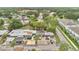 Wide aerial shot showcasing the community's layout with homes, mature trees, and lush surroundings at 2541 Leeward Way, Winter Park, FL 32792