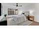Bright bedroom boasts natural light, ceiling fan, and neutral color palette at 2541 Leeward Way, Winter Park, FL 32792