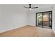 Bedroom area with flooring and black ceiling fan at 2541 Leeward Way, Winter Park, FL 32792