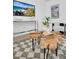 Cozy living room featuring a chic coffee table, modern art, and a flatscreen television for entertainment at 2541 Leeward Way, Winter Park, FL 32792