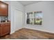 Bright dining area with wood floors, a window, and a closet at 2604 Bullion Loop, Sanford, FL 32771
