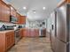 Modern kitchen with stainless steel appliances and an open view to the living area at 2604 Bullion Loop, Sanford, FL 32771