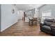 Bright and airy living space featuring wood floors and an open floor plan at 2604 Bullion Loop, Sanford, FL 32771