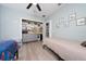 This ' room offers a built-in closet system, neutral walls, and decor with fun dinosaur art at 2707 Carmel Ct, Kissimmee, FL 34746