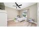 This ' room features a ceiling fan and a window for natural light, creating a fun play space at 2707 Carmel Ct, Kissimmee, FL 34746