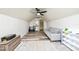 The bonus room offers additional living space with lots of sunlight, storage, and new flooring at 2707 Carmel Ct, Kissimmee, FL 34746