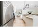 Modern kitchen with stainless steel refrigerator and granite countertops at 2707 Carmel Ct, Kissimmee, FL 34746