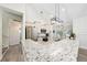 Bright kitchen featuring granite countertops and stainless steel appliances at 2707 Carmel Ct, Kissimmee, FL 34746