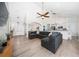 Spacious open-concept living area featuring vaulted ceilings, gorgeous floors, and an adjacent dining area at 2707 Carmel Ct, Kissimmee, FL 34746
