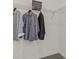 Organized closet with wire shelving, providing ample space for clothing and storage in a well-lit area at 2927 Believe In Yourself Ct, Clermont, FL 34714