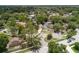 Aerial view showcases neighborhood with mature tree coverage at 309 Kirkcaldy Dr, Winter Springs, FL 32708