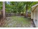 Spacious backyard with a wood fence offering privacy at 309 Kirkcaldy Dr, Winter Springs, FL 32708