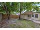 Backyard featuring a fenced perimeter and lush trees at 309 Kirkcaldy Dr, Winter Springs, FL 32708