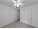 Bright bedroom featuring tile floors and a spacious closet at 309 Kirkcaldy Dr, Winter Springs, FL 32708