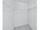 Walk-in closet featuring wire shelving, white walls, and tiled floors at 309 Kirkcaldy Dr, Winter Springs, FL 32708