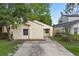Inviting single-story home boasts a well-manicured front yard and an inviting entryway at 309 Kirkcaldy Dr, Winter Springs, FL 32708