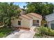 Single-story home with a well-kept yard and a welcoming entrance, perfect for families at 309 Kirkcaldy Dr, Winter Springs, FL 32708
