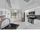 Updated kitchen with white cabinets, modern appliances, and a stylish backsplash at 309 Kirkcaldy Dr, Winter Springs, FL 32708