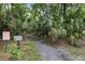 Explore the private nature trail winding through serene woodlands, exclusive for residents of the highlands at 309 Kirkcaldy Dr, Winter Springs, FL 32708