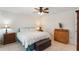 Bedroom featuring tile floors, neutral walls, and a ceiling fan at 3121 Natoma Way, Orlando, FL 32825