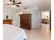 This bedroom features tile floors and access to the living room, bathroom and water closet at 3121 Natoma Way, Orlando, FL 32825