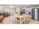 Eat-in kitchen is open to living area and features an open layout with abundant natural light and storage at 3121 Natoma Way, Orlando, FL 32825