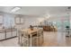 Eat-in kitchen open to living area features an open layout with abundant natural light and a cozy atmosphere at 3121 Natoma Way, Orlando, FL 32825