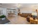Open-concept living space with combined kitchen and dining areas, offering ample space and natural light at 3121 Natoma Way, Orlando, FL 32825