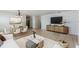 Spacious living area with tile flooring, modern furniture, and open layout perfect for entertaining at 3121 Natoma Way, Orlando, FL 32825