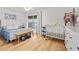 Serene bedroom with a comfortable bed, hardwood floors, and natural light, creating a peaceful retreat at 330 N Stone St, Deland, FL 32720
