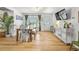 Airy dining room with a cozy dining set, large windows, and a convenient layout, ideal for entertaining guests at 330 N Stone St, Deland, FL 32720
